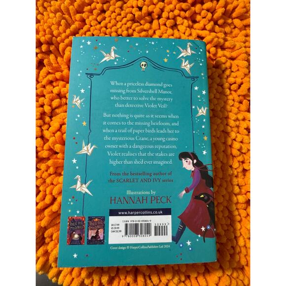 A Case of Grave Danger (The Violet Veil Mysteries) Paperback – October 5, 2021 - Picture 6 of 7